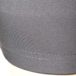 Close-up of a black Spandex Dome Cap being worn on a mannequin head. The cap is smooth with distinct vertical stitching lines to show the secure, snug fit.