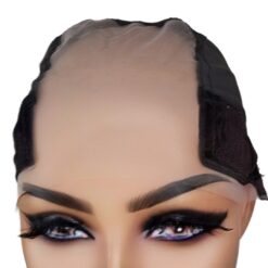 Velvet wig grip cap on mannequin head showing adjustable band and lace front, colour Brown