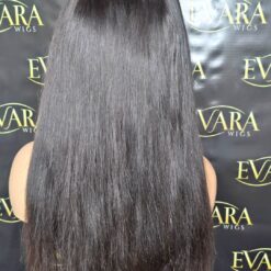 Back angle of 22 inch straight U-part wig on mannequin, showing smooth, full-length flow of black human hair